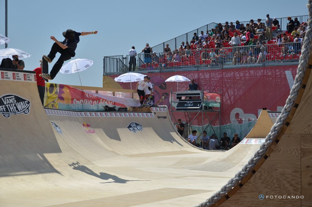 Skater airborne on the ramp in front of a packed grandstand, May 2014