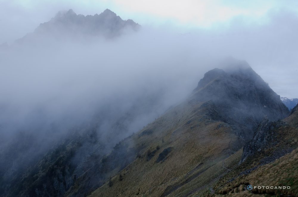 Mountain ridge wrapped in fog