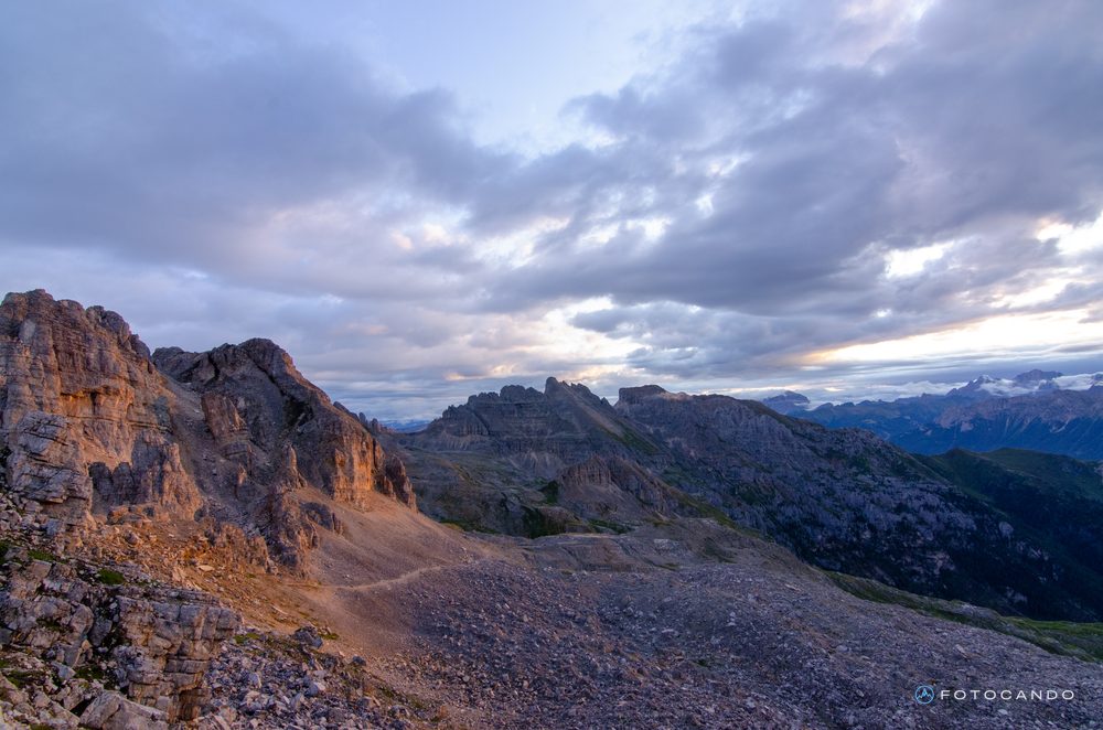 Rocks and trail in the first morning light, July 2021