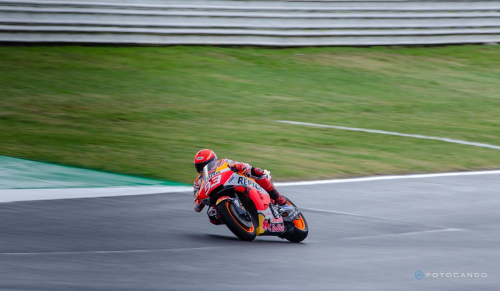MotoGP, rider leaning through a corner, 2021