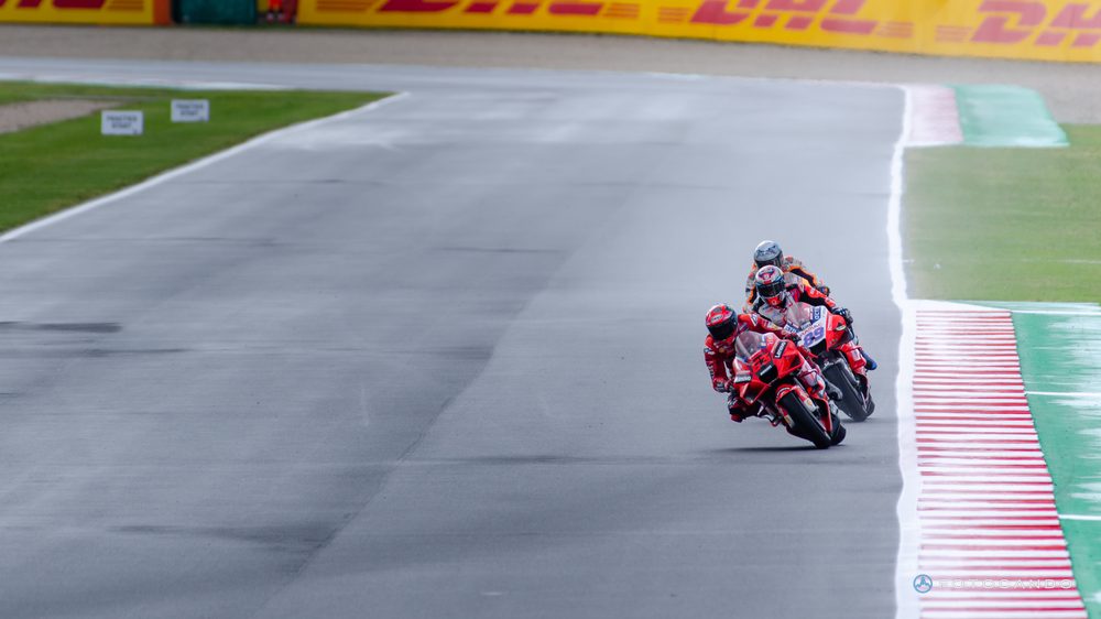 MotoGP, two riders exiting a corner, 2021